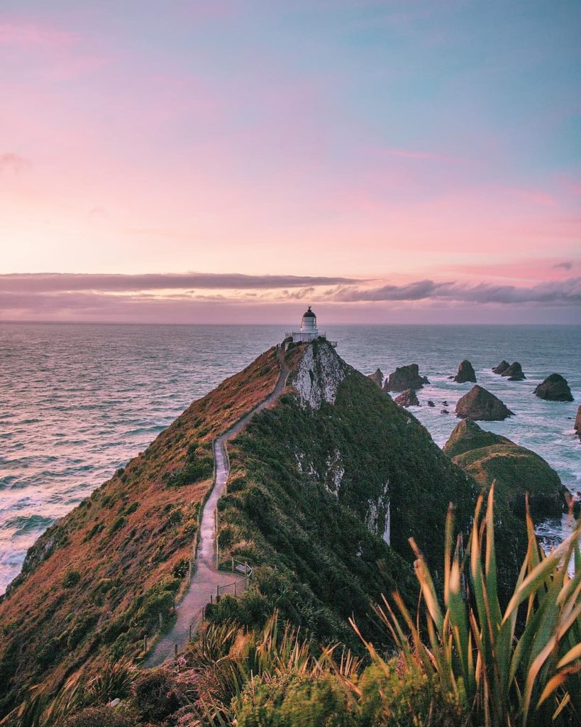 Nugget Point lighthouse by Brooke Saward